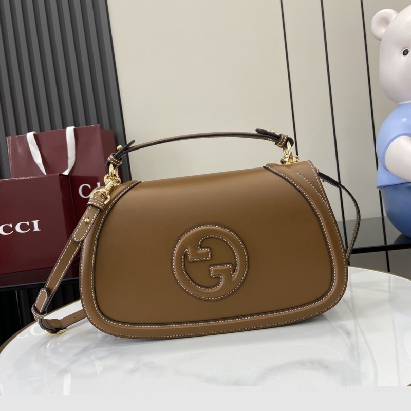 G*u*i top handle bags